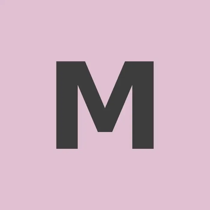 Bold white letter M on a square pink background tile. Bold white letter M on a square pink background tile.